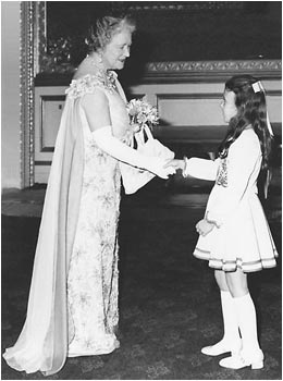 Tasmin, aged 8, meeting  H.M.Queen Elizabeth, the Queen Mother